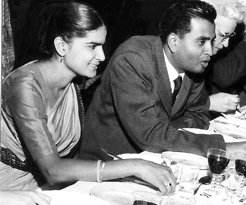 black and white photo of young Govindjee and Rajni Govindjee at a formal dinner event